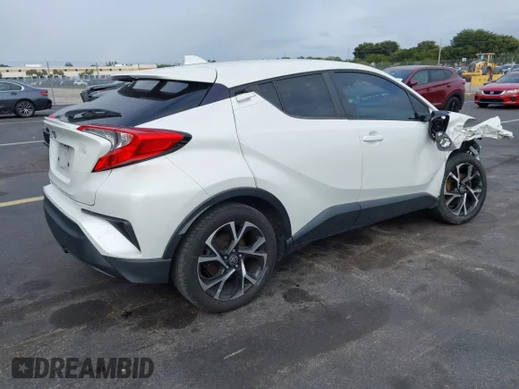 ✅ 2021 Toyota C-HR XLE • VIN: NMTKHMBX0MR124242 • Lot: 44216389. Wystawiony na IAAI z przebiegiem 60 979 mil. Bezpłatny archiwum sprzedaży aukcyjnych z USA i szczegółowy raport historii pojazdu na DreamBid. Zdjęcie 4.
