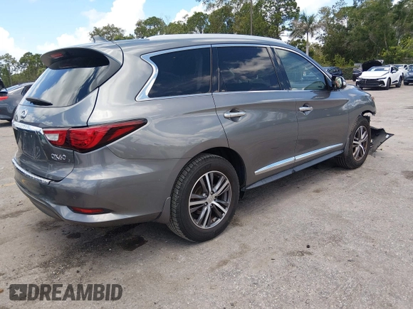 ✅ 2018 Infiniti QX60 • VIN: 5N1DL0MN2JC504897 • Lot: 45125156. Listed on IAAI with 112,511 mi. Free auction sales archive from the USA and detailed vehicle history report at DreamBid. Image 4.