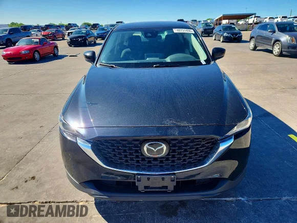 ✅ 2023 Mazda CX-5 S • VIN: JM3KFBAM5P0181697 • Лот: 48731496. Опубліковано раніше на Copart з пробігом 57 704 миль. Безкоштовний доступ до архіву аукціонних продажів зі США та докладний звіт про історію автомобіля на DreamBid. Зображення 5.