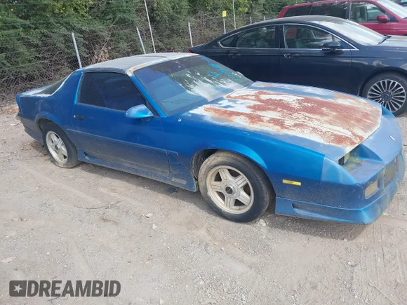 ✅ 1992 Chevrolet Camaro RS • VIN: 1G1FP23EXNL143383 • Lot: 43098716. Listed on IAAI with 181,189 mi. Free auction sales archive from the USA and detailed vehicle history report at DreamBid. Image 1.
