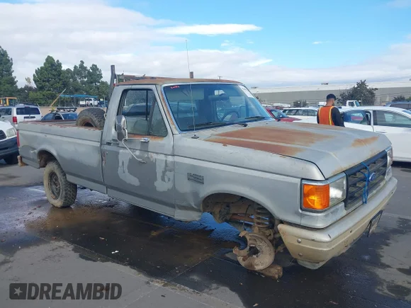 ✅ 1987 Ford F-150 • VIN: 1FTEF14Y5HPB29672 • Lot: 43689374. Listed on IAAI with 31,360 mi. Free auction sales archive from the USA and detailed vehicle history report at DreamBid. Image 1.