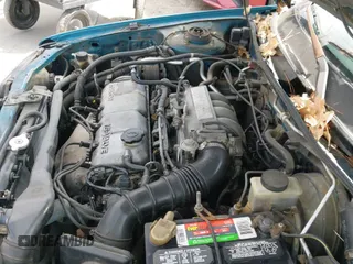 ✅ 1994 Mazda Protege DX • VIN: JM1BG2243R0739361 • Lot: 43490179. Wystawiony na IAAI z przebiegiem 300 060 mil. Bezpłatny archiwum sprzedaży aukcyjnych z USA i szczegółowy raport historii pojazdu na DreamBid. Zdjęcie 12.