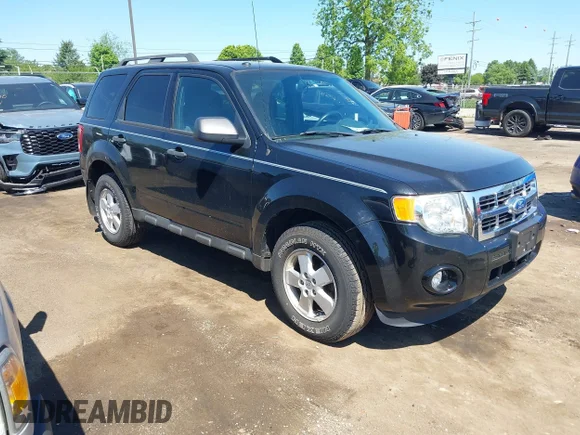 ✅ 2012 Ford Escape XLT • VIN: 1FMCU9D74CKB34026 • Lot: 45215366. Listed on IAAI with 143,347 mi. Free auction sales archive from the USA and detailed vehicle history report at DreamBid. Image 1.