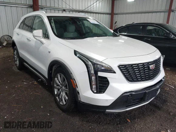 ✅ 2021 Cadillac XT4 AWD Premium Luxury • VIN: 1GYFZDR41MF057009 • Lot: 43739043. Listed on IAAI with 64,065 mi. Free auction sales archive from the USA and detailed vehicle history report at DreamBid. Image 1.
