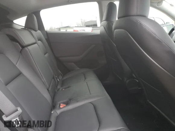 ✅ 2022 Tesla Model Y Long Range • VIN: 7SAYGDEE8NA009502 • Лот: 38199543. Опубликован ранее на Copart с пробегом 5 189 миль. Бесплатный доступ к архиву аукционных продаж из США и подробный отчёт об истории автомобиля на DreamBid. Изображение 11.