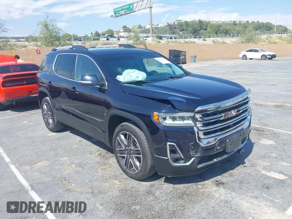 ✅ 2021 GMC Acadia SLT • VIN: 1GKKNMLS9MZ134414 • Лот: 45082300. Опубліковано раніше на IAAI з пробігом 69 855 миль. Безкоштовний доступ до архіву аукціонних продажів зі США та докладний звіт про історію автомобіля на DreamBid. Зображення 1.