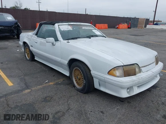 ✅ 1988 Ford Mustang • VIN: 1FABP40E7JF220733 • Lot: 42038846. Listed on IAAI with 26,391 mi. Free auction sales archive from the USA and detailed vehicle history report at DreamBid. Image 1.