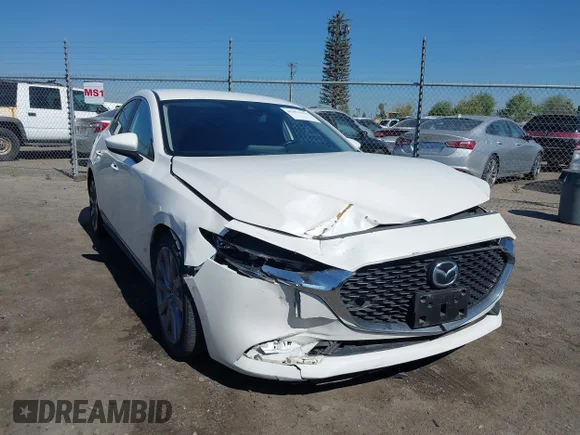 ✅ 2021 Mazda 3 Select • VIN: JM1BPABL7M1330705 • Lot: 41871677. Listed on IAAI with 67,273 mi. Free auction sales archive from the USA and detailed vehicle history report at DreamBid. Image 1.