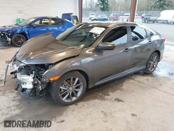 ✅ 2019 Honda Civic EX-L • VIN: JHMFC1F7XKX009907 • Lot: 43788103. Listed on IAAI with 93,002 mi. Free auction sales archive from the USA and detailed vehicle history report at DreamBid. Image 2.