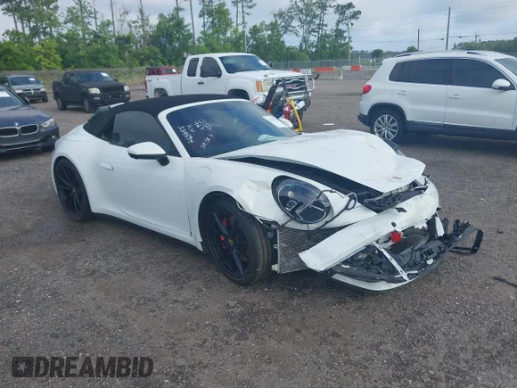 ✅ 2020 Porsche 911 Carrera S • VIN: WP0CB2A90LS263324 • Лот: 42428119. Опубліковано раніше на IAAI з пробігом 20 186 миль. Безкоштовний доступ до архіву аукціонних продажів зі США та докладний звіт про історію автомобіля на DreamBid. Зображення 1.