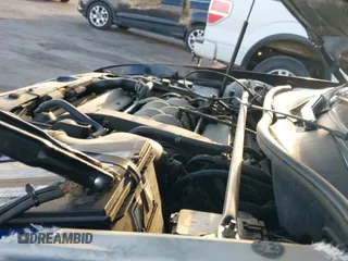 ✅ 2002 Lincoln Continental • VIN: 1LNHM97V92Y687640 • Lot: 41863683. Listed on IAAI with 59,895 mi. Free auction sales archive from the USA and detailed vehicle history report at DreamBid. Image 13.