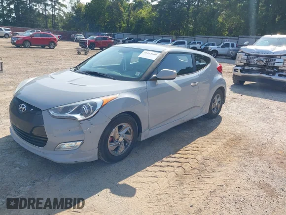 ✅ 2013 Hyundai Veloster w/Black Int • VIN: KMHTC6AD8DU162302 • Lot: 43135660. Listed on IAAI with 192,923 mi. Free auction sales archive from the USA and detailed vehicle history report at DreamBid. Image 2.