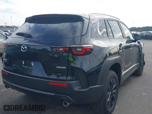 ✅ 2025 Mazda CX-50 S Preferred • VIN: 7MMVABBMXSN364043 • Lot: 43321605. Listed on IAAI with 8,449 mi. Free auction sales archive from the USA and detailed vehicle history report at DreamBid. Image 4.