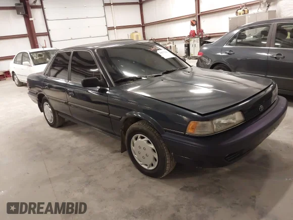 ✅ 1991 Toyota Camry DLX • VIN: 4T1SV21E1MU343362 • Lot: 44171288. Listed on IAAI with 126,947 mi. Free auction sales archive from the USA and detailed vehicle history report at DreamBid. Image 1.