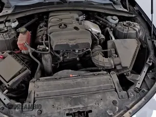 ✅ 2020 Chevrolet Camaro 1LT • VIN: 1G1FB3DX0L0130628 • Lot: 80318235. Listed on Copart with 83,509 mi. Free auction sales archive from the USA and detailed vehicle history report at DreamBid. Image 14.