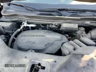 ✅ 2020 Honda Pilot EX-L • VIN: 5FNYF6H59LB013534 • Lot: 81989425. Listed on Copart with 84,328 mi. Free auction sales archive from the USA and detailed vehicle history report at DreamBid. Image 17.