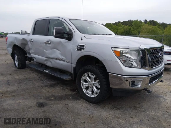 ✅ 2016 Nissan Titan Platinum Reserve • VIN: 1N6BA1F44GN513445 • Lot: 44908012. Listed on IAAI with 97,710 mi. Free auction sales archive from the USA and detailed vehicle history report at DreamBid. Image 1.