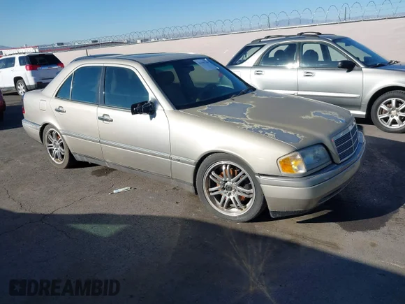 ✅ 1996 Mercedes-Benz C • VIN: WDBHA28E6TF411320 • Lot: 43389760. Listed on IAAI with 177,700 mi. Free auction sales archive from the USA and detailed vehicle history report at DreamBid. Image 1.