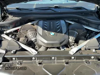✅ 2022 BMW X5 M50i • VIN: 5UXJU4C06N9M08631 • Лот: 82099555. Опубликован ранее на Copart с пробегом 74 026 миль. Бесплатный доступ к архиву аукционных продаж из США и подробный отчёт об истории автомобиля на DreamBid. Изображение 11.