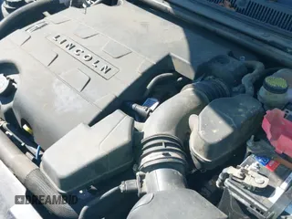 ✅ 2015 Lincoln MKS • VIN: 1LNHL9EK9FG605347 • Lot: 42241372. Listed on IAAI with 89,816 mi. Free auction sales archive from the USA and detailed vehicle history report at DreamBid. Image 18.