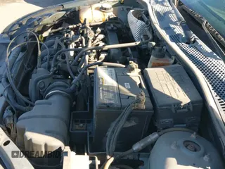 ✅ 2005 Ford Focus S • VIN: 1FAFP34N95W265653 • Lot: 43308673. Wystawiony na IAAI z przebiegiem 191 546 mil. Bezpłatny archiwum sprzedaży aukcyjnych z USA i szczegółowy raport historii pojazdu na DreamBid. Zdjęcie 20.