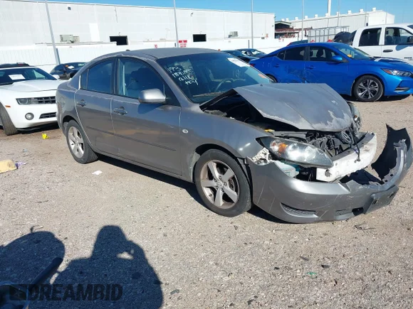 ✅ 2006 Mazda 3 i • VIN: JM1BK12F761471110 • Lot: 44050343. Listed on IAAI with 152,228 mi. Free auction sales archive from the USA and detailed vehicle history report at DreamBid. Image 1.