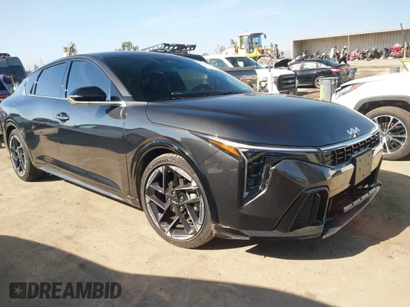 ✅ 2025 Kia K4 GT-Line • VIN: 3KPFW4DE8SE052492 • Lot: 44797068. Listed on IAAI with 22,337 mi. Free auction sales archive from the USA and detailed vehicle history report at DreamBid. Image 1.
