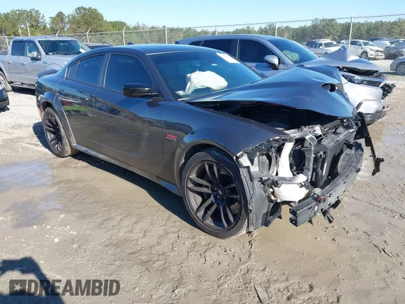 ✅ 2023 Dodge Charger Scat Pack • VIN: 2C3CDXGJ3PH701733 • Lot: 43920970. Wystawiony na IAAI z przebiegiem 16 394 mil. Bezpłatny archiwum sprzedaży aukcyjnych z USA i szczegółowy raport historii pojazdu na DreamBid. Zdjęcie 1.