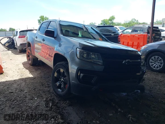 ✅ 2021 Chevrolet Colorado 2WD LT • VIN: 1GCGSCEAXM1127821 • Лот: 42248325. Опубликован ранее на IAAI с пробегом 51 035 миль. Бесплатный доступ к архиву аукционных продаж из США и подробный отчёт об истории автомобиля на DreamBid. Изображение 1.