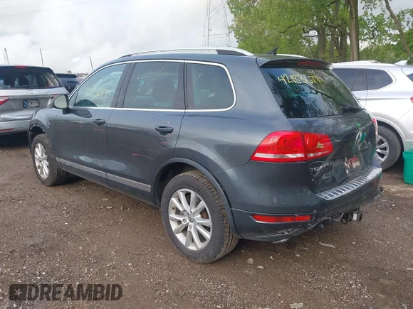 ✅ 2014 Volkswagen Touareg Sport • VIN: WVGEF9BP6ED007632 • Lot: 42183677. Wystawiony na IAAI z przebiegiem 166 245 mil. Bezpłatny archiwum sprzedaży aukcyjnych z USA i szczegółowy raport historii pojazdu na DreamBid. Zdjęcie 3.
