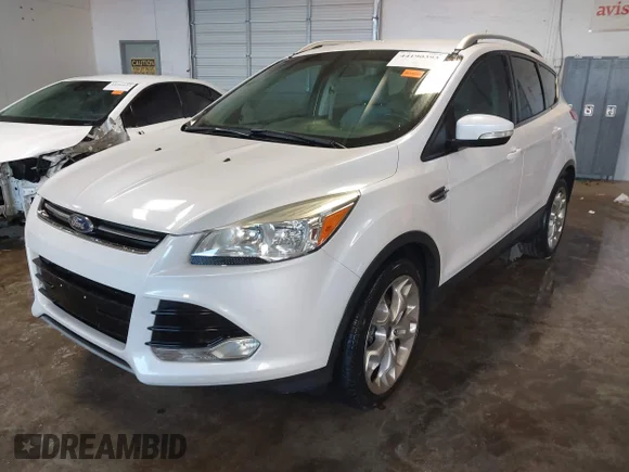 ✅ 2014 Ford Escape Titanium • VIN: 1FMCU0J92EUE25777 • Lot: 44190393. Wystawiony na IAAI z przebiegiem 144 782 mil. Bezpłatny archiwum sprzedaży aukcyjnych z USA i szczegółowy raport historii pojazdu na DreamBid. Zdjęcie 2.