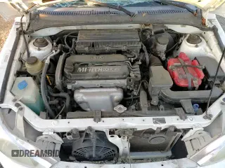 ✅ 2001 Kia Rio • VIN: KNADC123216521898 • Lot: 82702174. Listed on Copart with 86,255 mi. Free auction sales archive from the USA and detailed vehicle history report at DreamBid. Image 13.