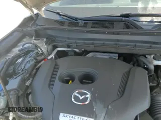 ✅ 2025 Mazda CX-5 Premium • VIN: JM3KFBDY0S0664098 • Лот: 63104395. Опубликован ранее на Copart с пробегом 1 061 миль. Бесплатный доступ к архиву аукционных продаж из США и подробный отчёт об истории автомобиля на DreamBid. Изображение 13.