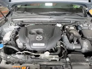 ✅ 2023 Mazda CX-50 Premium • VIN: 7MMVABDY0PN127424 • Лот: 61006555. Опубликован ранее на Copart с пробегом 50 798 миль. Бесплатный доступ к архиву аукционных продаж из США и подробный отчёт об истории автомобиля на DreamBid. Изображение 14.