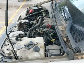 ✅ 2005 Pontiac Montana 1SA • VIN: 1GMDV23E15D139894 • Lot: 42221598. Wystawiony na IAAI z przebiegiem 309 015 mil. Bezpłatny archiwum sprzedaży aukcyjnych z USA i szczegółowy raport historii pojazdu na DreamBid. Zdjęcie 12.