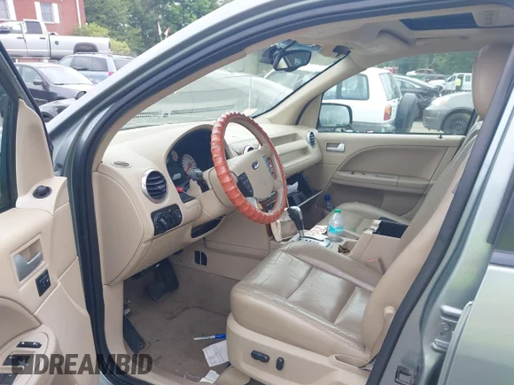 ✅ 2005 Ford Freestyle Limited • VIN: 1FMDK06165GA59737 • Lot: 42671700. Wystawiony na IAAI z przebiegiem 59 424 mil. Bezpłatny archiwum sprzedaży aukcyjnych z USA i szczegółowy raport historii pojazdu na DreamBid. Zdjęcie 5.