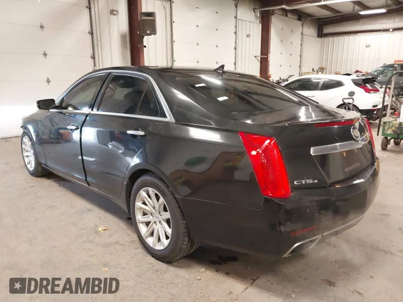 ✅ 2014 Cadillac CTS Luxury AWD • VIN: 1G6AX5S36E0173682 • Лот: 41538709. Опубликован ранее на IAAI с пробегом 102 772 миль. Бесплатный доступ к архиву аукционных продаж из США и подробный отчёт об истории автомобиля на DreamBid. Изображение 3.