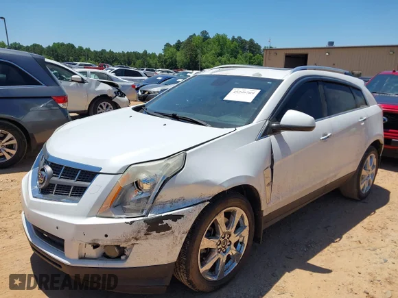 ✅ 2012 Cadillac SRX Premium Collection • VIN: 3GYFNCE34CS602164 • Lot: 45299709. Wystawiony na IAAI z przebiegiem 172 945 mil. Bezpłatny archiwum sprzedaży aukcyjnych z USA i szczegółowy raport historii pojazdu na DreamBid. Zdjęcie 2.