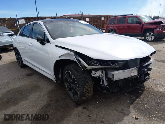 ✅ 2023 Kia K5 GT-Line • VIN: 5XXG64J24PG208427 • Лот: 44820727. Опубликован ранее на IAAI с пробегом 44 403 миль. Бесплатный доступ к архиву аукционных продаж из США и подробный отчёт об истории автомобиля на DreamBid. Изображение 1.
