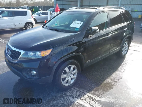 ✅ 2013 Kia Sorento LX • VIN: 5XYKTCA65DG386614 • Lot: 44202105. Listed on IAAI with 250,669 mi. Free auction sales archive from the USA and detailed vehicle history report at DreamBid. Image 2.