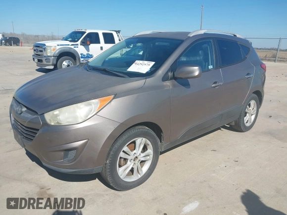 ✅ 2011 Hyundai Tucson GLS • VIN: KM8JU3ACXBU206422 • Lot: 44292575. Wystawiony na IAAI z przebiegiem 213 442 mil. Bezpłatny archiwum sprzedaży aukcyjnych z USA i szczegółowy raport historii pojazdu na DreamBid. Zdjęcie 2.