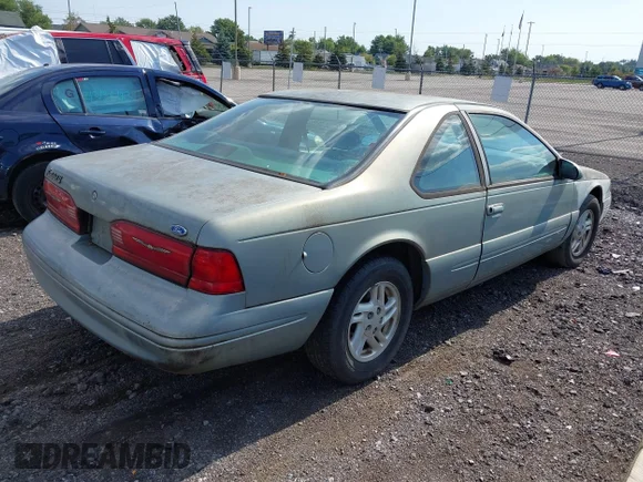 ✅ 1997 Ford Thunderbird LX • VIN: 1FALP6245VH149448 • Лот: 43162404. Опубліковано раніше на IAAI з пробігом 68 159 миль. Безкоштовний доступ до архіву аукціонних продажів зі США та докладний звіт про історію автомобіля на DreamBid. Зображення 4.