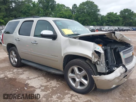 ✅ 2014 Chevrolet Tahoe LTZ • VIN: 1GNSCCE04ER213277 • Lot: 45141868. Listed on IAAI with 171,763 mi. Free auction sales archive from the USA and detailed vehicle history report at DreamBid. Image 1.