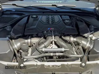 ✅ 2022 BMW M8 Competition • VIN: WBSGV0C01NCJ56705 • Лот: 67139325. Опубликован ранее на Copart с пробегом 13 686 миль. Бесплатный доступ к архиву аукционных продаж из США и подробный отчёт об истории автомобиля на DreamBid. Изображение 13.