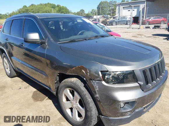✅ 2011 Jeep Grand Cherokee Laredo • VIN: 1J4RR4GG8BC636331 • Lot: 45267498. Listed on IAAI with 227,934 mi. Free auction sales archive from the USA and detailed vehicle history report at DreamBid. Image 1.