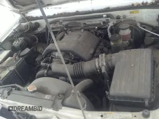 ✅ 1998 Isuzu Rodeo S • VIN: 4S2CM58WXW4307155 • Lot: 35066319. Wystawiony na IAAI z przebiegiem 149 898 mil. Bezpłatny archiwum sprzedaży aukcyjnych z USA i szczegółowy raport historii pojazdu na DreamBid. Zdjęcie 13.