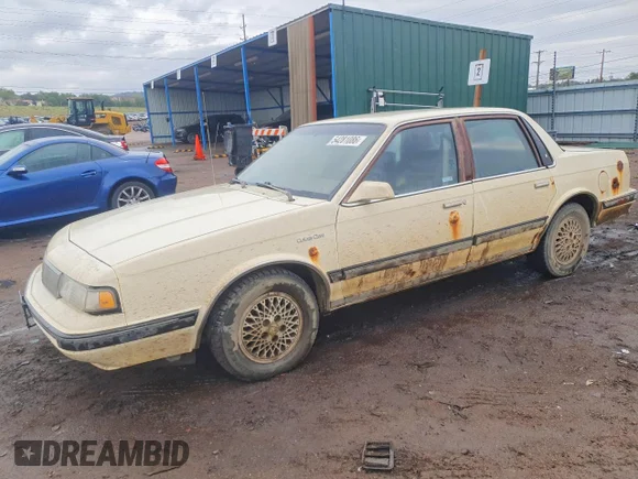 ✅ 1990 OLDSMOBILE CUTLASS CUTLASS CIERA • VIN: 1G3AM54N8L6350280 • Lot: 54281086. Listed on Copart with 450,533 mi. Free auction sales archive from the USA and detailed vehicle history report at DreamBid. Image 1.