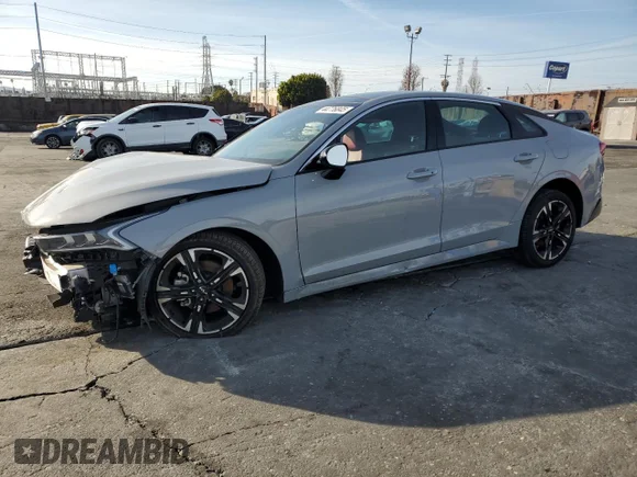 ✅ 2024 Kia K5 GT-Line • VIN: 5XXG64J23RG257556 • Лот: 44776845. Опубликован ранее на Copart с пробегом 20 771 миль. Бесплатный доступ к архиву аукционных продаж из США и подробный отчёт об истории автомобиля на DreamBid. Изображение 1.