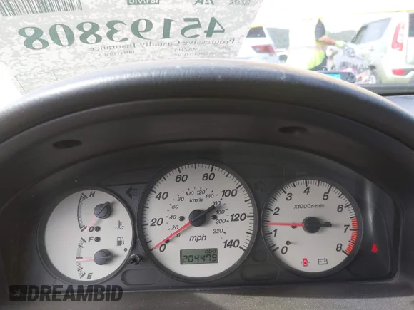 ✅ 2002 Mazda Protege • VIN: JM1BJ246121447160 • Lot: 45193808. Wystawiony na IAAI z przebiegiem 204 479 mil. Bezpłatny archiwum sprzedaży aukcyjnych z USA i szczegółowy raport historii pojazdu na DreamBid. Zdjęcie 7.