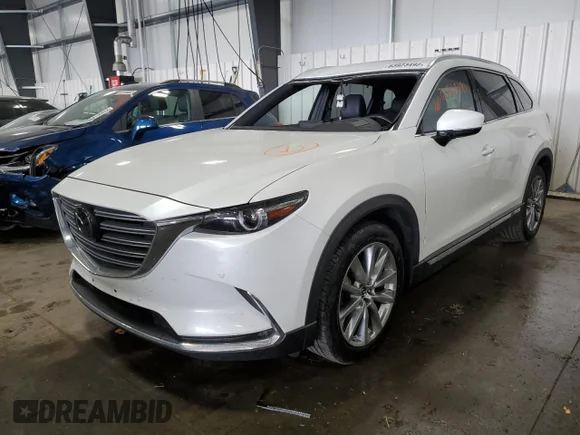 ✅ 2019 Mazda CX-9 Grand Touring • VIN: JM3TCBDY5K0303625 • Lot: 63923492. Listed on Copart with 64,663 mi. Free auction sales archive from the USA and detailed vehicle history report at DreamBid. Image 2.